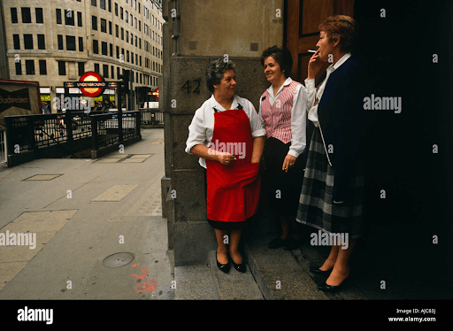 Women chatting on a city street